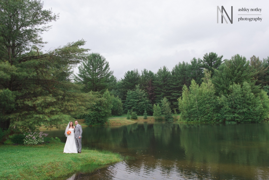Bride and groom by the pond at Beantown Ranch wedding